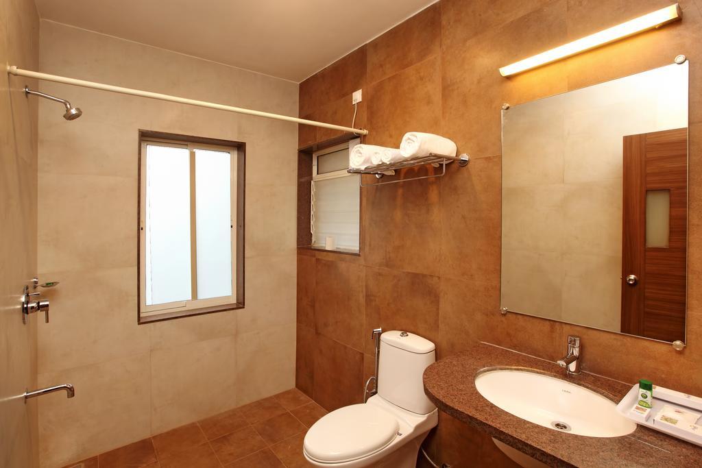 Athome Comforts Панаджи Номер фото